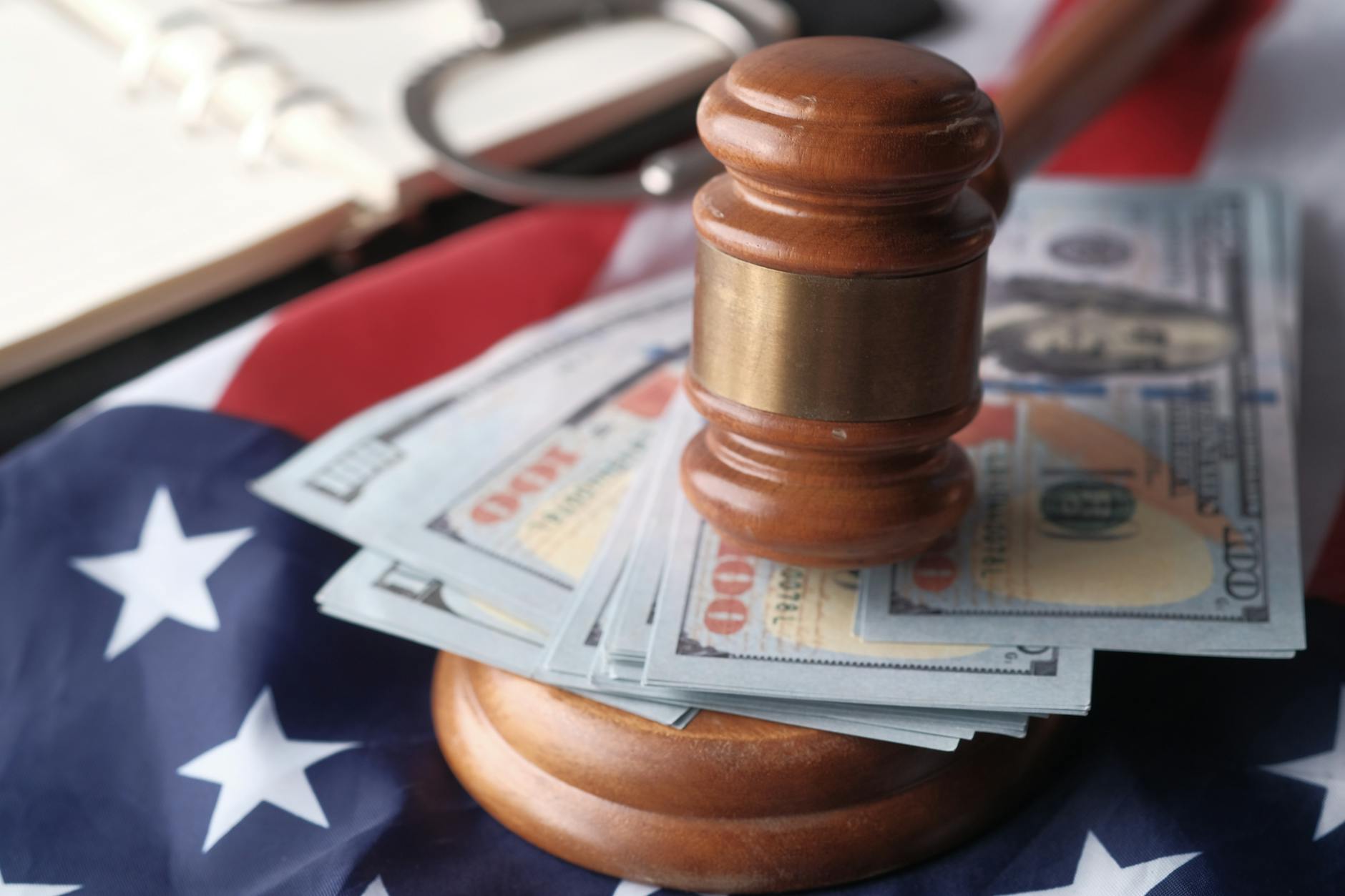 close up of banknotes and a gavel